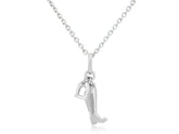 A sterling silver pendant featuring a riding boot and stirrup with a chain, displayed against a white background.